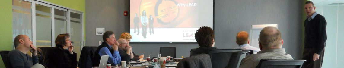 Man Presenting to a Group of executives