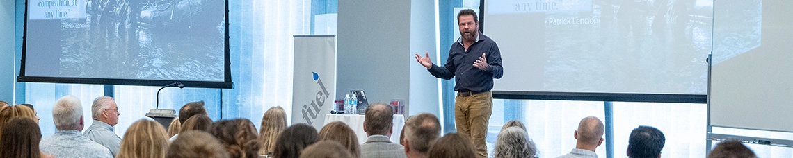 Man Presenting to a Group of executives